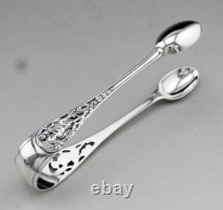 Antique solid silver sugar tongs with English London hallmarks 1894