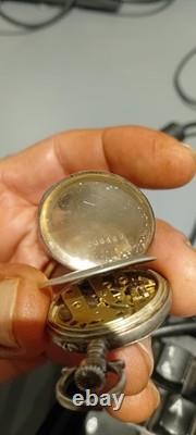 Antique women's watch stamped solid silver, dial pattern with gold hands
