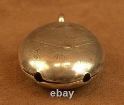 Beautiful ancient silver bell with a decoration of seagulls and swallows.