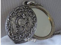 Beautiful antique art nouveau solid silver mirror pendant necklace with hallmarks.