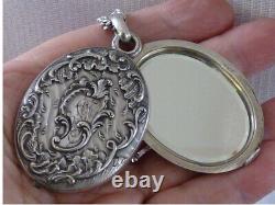 Beautiful antique art nouveau solid silver mirror pendant necklace with hallmarks.
