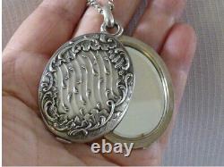 Beautiful antique art nouveau solid silver mirror pendant necklace with hallmarks.