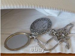 Beautiful antique art nouveau solid silver mirror pendant necklace with hallmarks.