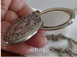 Beautiful antique art nouveau solid silver mirror pendant necklace with hallmarks.