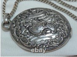 Beautiful antique art nouveau solid silver mirror pendant necklace with hallmarks.