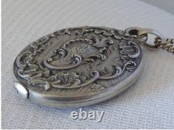 Beautiful antique art nouveau solid silver mirror pendant necklace with hallmarks.