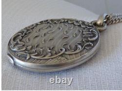 Beautiful antique art nouveau solid silver mirror pendant necklace with hallmarks.