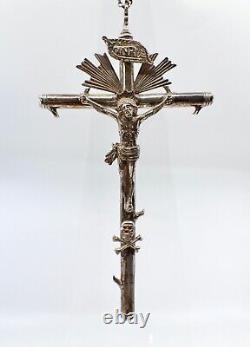 Important regional ancient solid silver crucifix from the early 19th century.