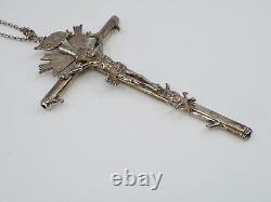 Important regional ancient solid silver crucifix from the early 19th century.