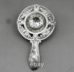 Magnificent ANTIQUE TEA STRAINER in STERLING SILVER Minerva 1st Title 19th Century