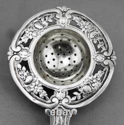 Magnificent ANTIQUE TEA STRAINER in STERLING SILVER Minerva 1st Title 19th Century