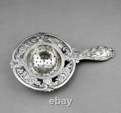 Magnificent ANTIQUE TEA STRAINER in STERLING SILVER Minerva 1st Title 19th Century Magnificent ANTIQUE TEA STRAINER in STERLING SILVER Minerva 1st Title 19th Century