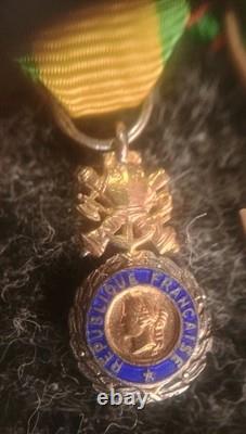 Old 8-medal reduction bar with 2 solid silver medals