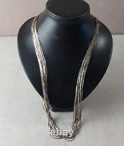 Old multi-chain necklace / 30-row X, in solid silver