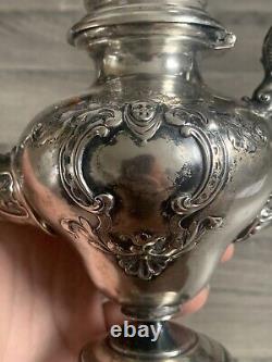 Old selfish solid silver teapot from the 19th century