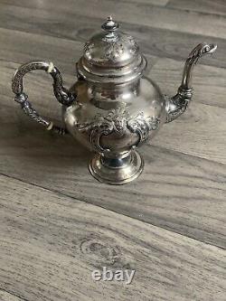 Old selfish solid silver teapot from the 19th century