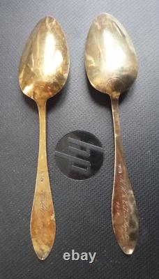 Pair of antique solid silver and vermeil soup spoons from the 19th century