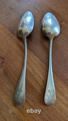 Pair of antique solid silver spoons, Minerva hallmark and silversmith’s mark
