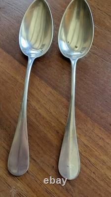 Pair of antique solid silver spoons, Minerva hallmark and silversmith’s mark