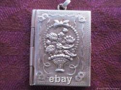 Photo locket pendant in antique Art Nouveau silver