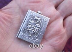 Photo locket pendant in antique Art Nouveau silver