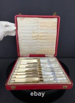 Set of 12 antique vermeil and mother-of-pearl knives by Lavallée Silversmith