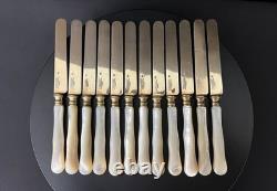 Set of 12 antique vermeil and mother-of-pearl knives by Lavallée Silversmith