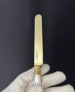 Set of 12 antique vermeil and mother-of-pearl knives by Lavallée Silversmith