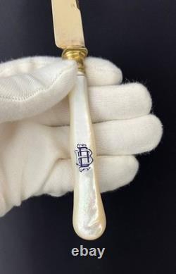 Set of 12 antique vermeil and mother-of-pearl knives by Lavallée Silversmith