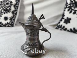 Small antique silver coffee pot with 700 hallmark Arabic coffee maker.