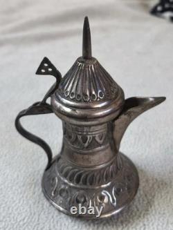 Small antique silver coffee pot with 700 hallmark Arabic coffee maker.