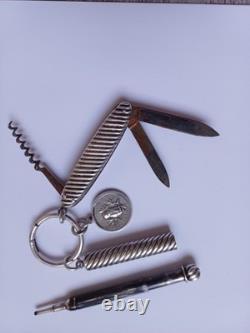 Solid silver lot, antique pencil holder, S. Mordan & Co., O. Roty medal, knife
