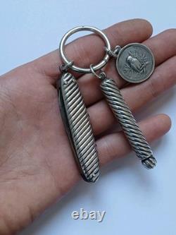 Solid silver lot, antique pencil holder, S. Mordan & Co., O. Roty medal, knife