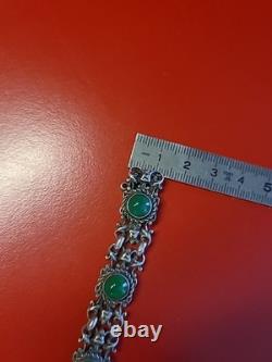Very beautiful antique articulated bracelet in solid silver and green cabochons