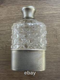 Ancien flasque à alcool en cristal taillé et argent massif minerve