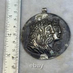 Ancienne amulette pendentif romaine en argent massif 2 visages rois