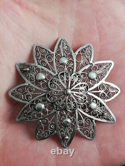 Ancienne broche Fleur en argent massif ajourée