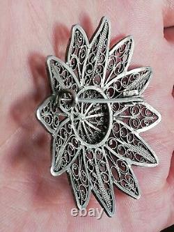 Ancienne broche Fleur en argent massif ajourée