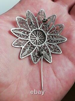 Ancienne broche Fleur en argent massif ajourée