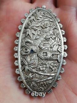Ancienne broche en argent massif à identifier