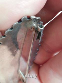 Ancienne broche en argent massif à identifier
