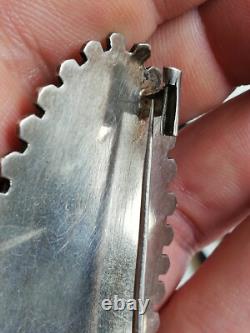 Ancienne broche en argent massif à identifier