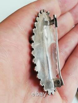 Ancienne broche en argent massif à identifier