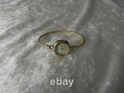 Ancienne montre bracelet Art Déco argent massif et vermeil