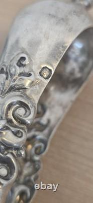 Ancienne pince à glaçons en argent massif poinçonnée style Louis XV Rocaille
