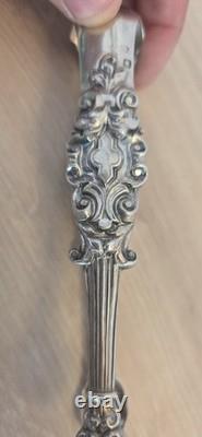 Ancienne pince à glaçons en argent massif poinçonnée style Louis XV Rocaille