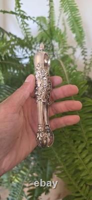 Ancienne pince à glaçons en argent massif poinçonnée style Louis XV Rocaille