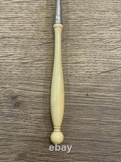 Ancienne saupoudreuse en argent massif vieillard