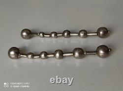 Anciennes boucles d'oreilles pendantes en argent massif