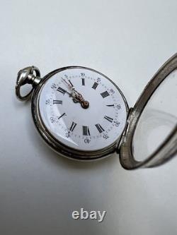 Montre de poche ancienne en argent massif à clé cadran émail chiffres romains